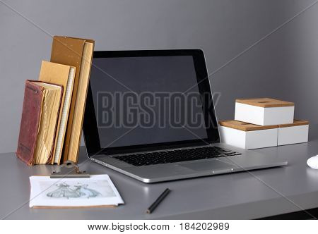 Workspace with computer and documents in office .