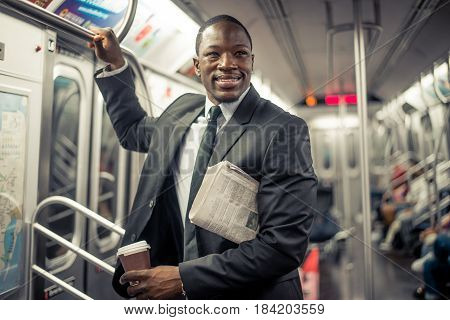 Businessman in full suit in New York subway metro