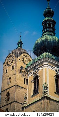 Clock tower and church dome in Krems Austria