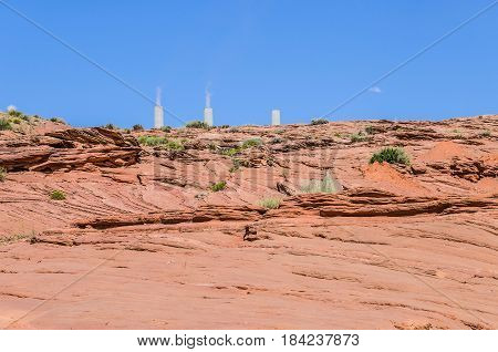 Navajo Generating Station a coal-fired steam plant near Page Arizona. This power plant is one of the biggest pollution emitter in the United States.