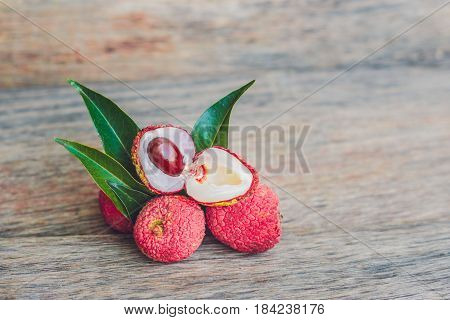 Fresh Litchi Fruit On An Old Wooden Background