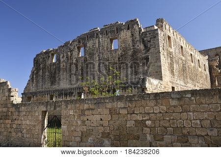 Ruin and part of the old wall in Famagusta town in the North of Cyprus with a blue sky in background.