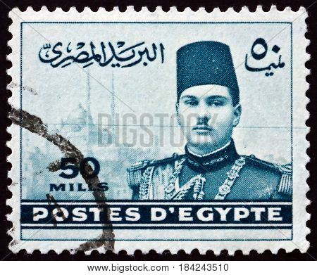 EGYPT - CIRCA 1939: a stamp printed in Egypt shows King Farouk and Cairo Citadel circa 1939