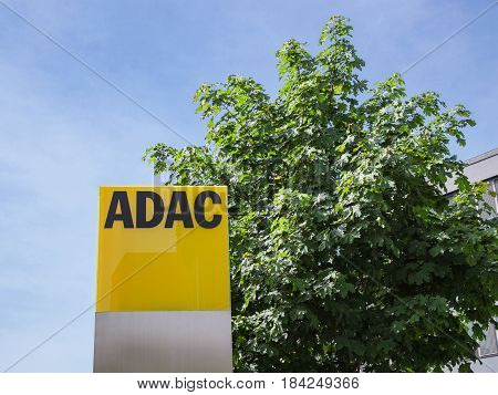 Munich Germany - May 12 2015: ADAC signage with German automobile club logo largest automobile association in Europe.