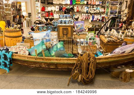 Leknes Norway - March 19 2017: Traditional norwegian souvenirs on the showcase of tourist shop in Leknes town