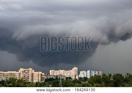 Tornado, Thunderstorm, Funnel Clouds Over The City.