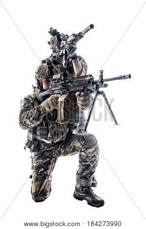 Two Army Rangers in field Uniforms with weapon. Studio shot