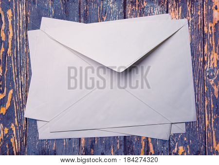 Evenlopes On Wooden Background