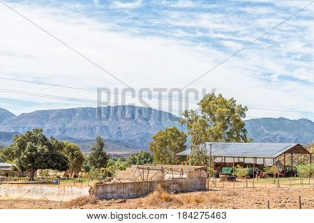 BONNIEVALE SOUTH AFRICA - MARCH 26 2017: A farm scene with a shed covered in solar panels near Bonnievale in the Western Cape Province