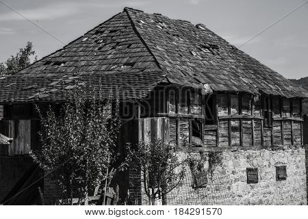 my old house, house in black and white, antique house, house made of wood and stone, historic house,  countryside house, very old house photography in black and white color