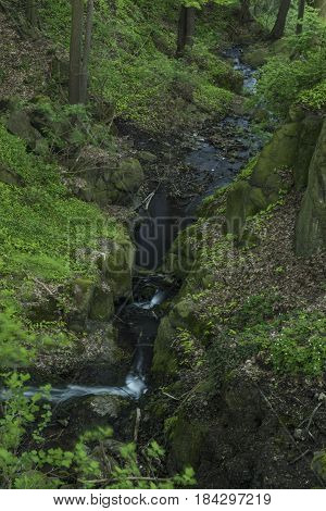 Waterfall near Moravany village in spring green evening