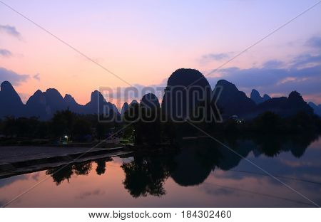 Karst mountain and Yulong river landscape in Yangshou China
