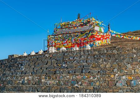 Sichuan China - April 8 2017 : Prayer flags on the hill at Zheduo Shan Pass Kangding Sichuan China