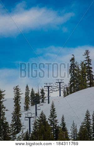 Snow in Spring time has ski Lifts ready to go