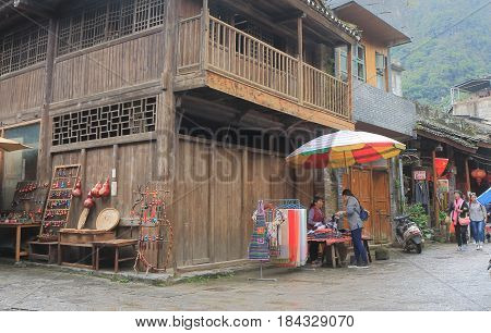 YANGSHOU CHINA - NOVEMBER 19, 2016: Unidentified people visit Xingping historical village. Xingping is a historical fishing village near Li river.