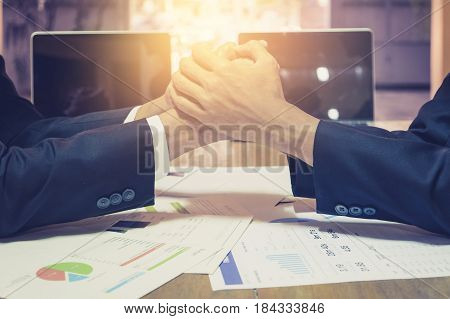 Two businessmen shaking hands during a meeting in the office success dealing greeting & business partner.