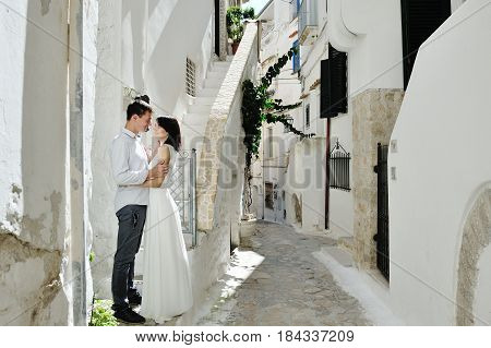 Happy romantic couple in Sperlonga Italy Europe