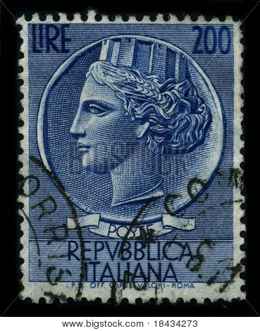 Italien - CIRCA 1959: Et frimærke, trykt i Italien viser billedet af den dedikerede til Republica Italiana 