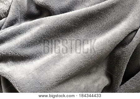 the texture of the fleece grey clothing close up