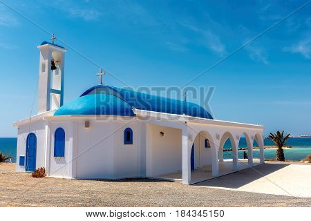 White chapel on a shore near Aiya Napa, Cyprus.