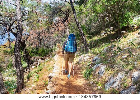 Hiking in famous Lycian Way in the Turkey. Backpacker in the trail.
