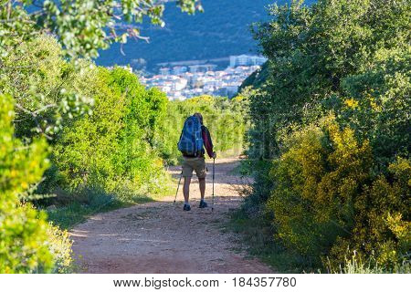 Hiking in famous Lycian Way in the Turkey. Backpacker in the trail.