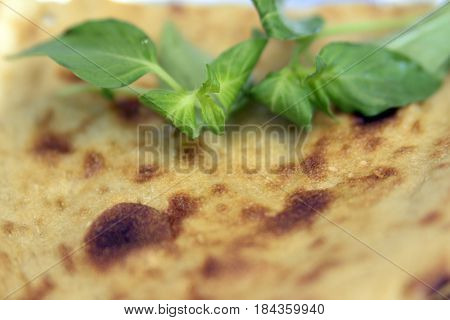 Iranian breakfast at the office with Sangak bread(flat bread) and Basil