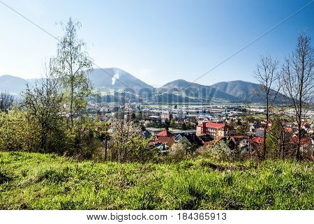 Kysucke Nove Mesto city with hills on the background and clear sky in Slovakia during nice spring day