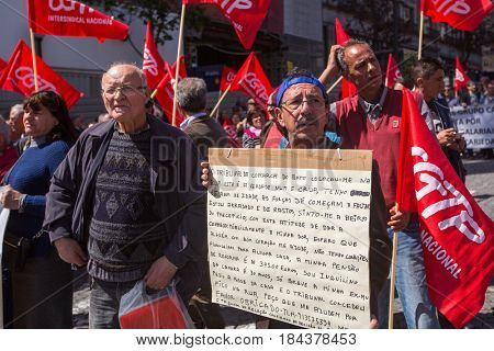 PORTO, PORTUGAL - MAY 1, 2017: During celebration of May Day in the city centre. General Confederation of Portuguese workers, traditionally associated with the Communist party, has 800.000 members.