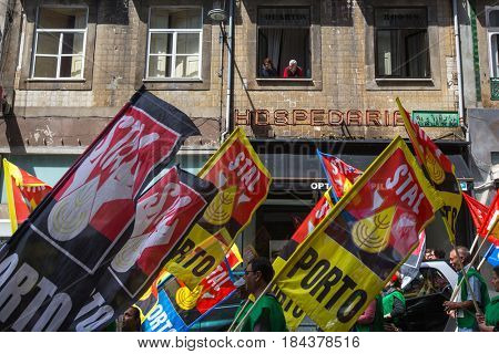 PORTO, PORTUGAL - MAY 1, 2017: During celebration of May Day in the city centre. General Confederation of Portuguese workers, traditionally associated with the Communist party, has 800.000 members.