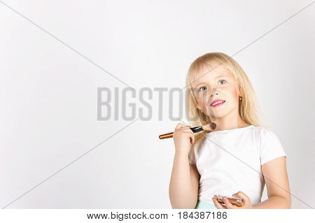 Little Happy Girl Looking In The Mirror Colors Face,