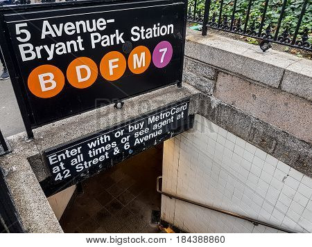 New York USA - September 12 2016: 5th Avenue - Bryant Park station entance sign. Lines B D F M and 7