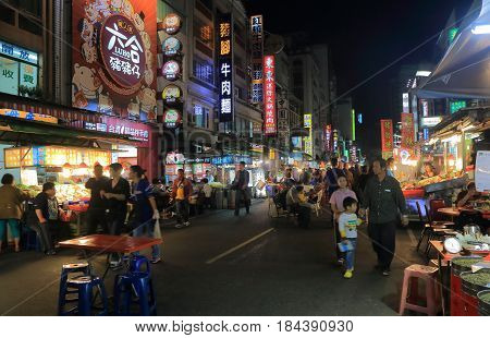 KAOHSIUNG TAIWAN - DECEMBER 13, 2016: Unidentified people visit Liuhe night street market. Liuhe market is one of the most popular markets in Taiwan.