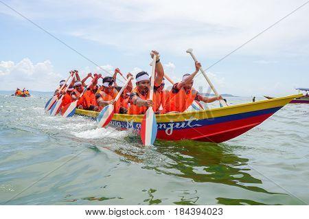 Labuan,Malaysia-April 29,2017:Group of boatman with life jacket participate in a boat tug of war games in Labuan International Sea Sports Complex at Labuan,Malaysia on 29th April 2017.