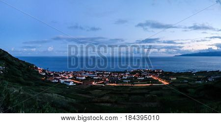 Aerial view to Vila do Corvo and Flores island at sunset in Corvo island Azores Portugal
