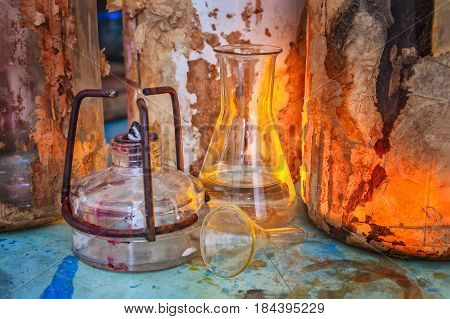 The old lab. The table of the alchemist. Laboratory table stained with chemicals and poisons.