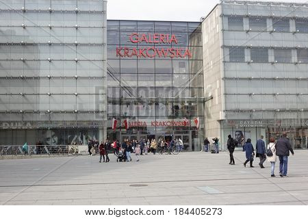 KRAKOW, POLAND - APRIL 30, 2017: People at the entrance of Galeria Krakowska.