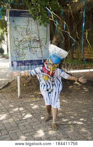 Asian Thai Woman Wearing Mask Head With Costume Of Phi Ta Khon Dance And Playing At Phi Ta Khon Muse