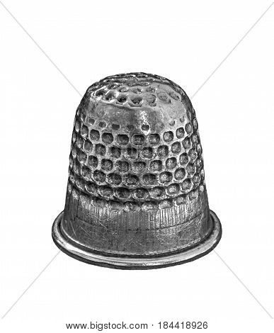 Silver thimble isolated on white background .