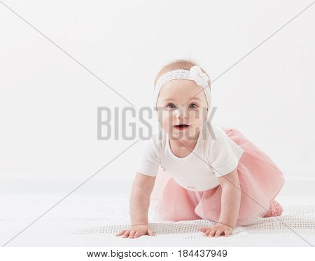 the happy little girl on floor indoor