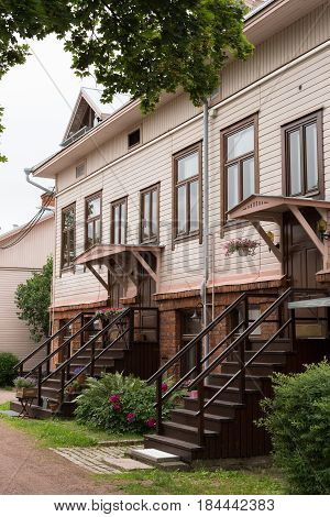 Traditional street with old cottage houses in Finland