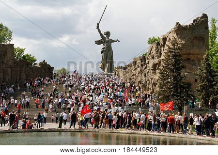Volgograd Russia - May 9 2016: Procession of local people with photos of their relatives in Immortal Regiment on annual Victory Day on Mamaev Hill in Volgograd