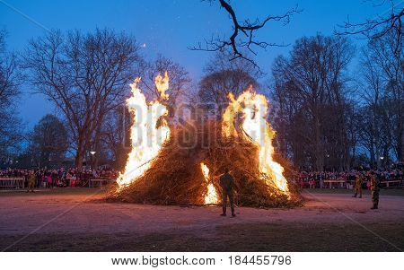 NORRKOPING, SWEDEN - APRIL 30, 2017: Traditional Swedish celebration of spring at Walpurgis night with bonfire and music at Folkparken in Norrkoping. The festival is named after Saint Walpurga.