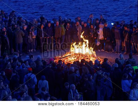 STOCKHOLM SWEDEN - APR 30 2017: Celebrating the spring with the Valborg bonfire at Riddarholmen in the evening April 30 2017 in Stockholm Sweden