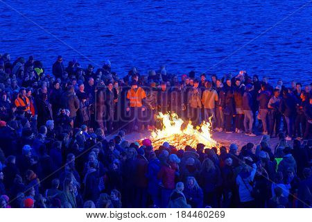 STOCKHOLM SWEDEN - APR 30 2017: Celebrating the spring with the Valborg bonfire at Riddarholmen in the evening April 30 2017 in Stockholm Sweden