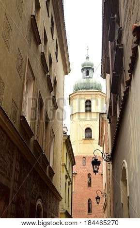 Fragment of the narrow street. Architecture of the old city of Warsaw. Poland.