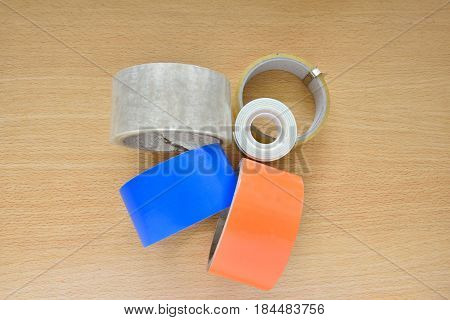 sticky tape colorful on wood desk in studio