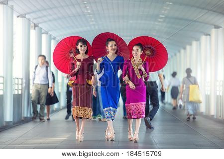 Asian woman wearing traditional Laos culturevintage styleLaos traditional suitLaos vintage styleLaos woman sabuydeeLaos dressLaos