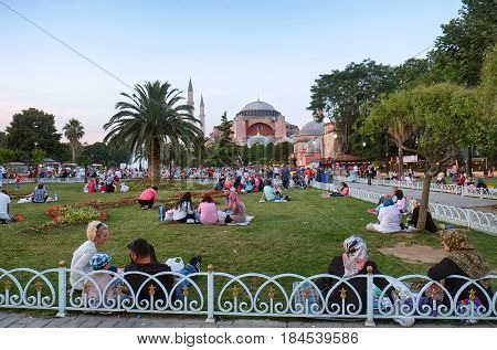 The Muslims Waiting For The Evening Meal (iftar) In Ramadan In Front Of Hagia Sophia, Istanbul