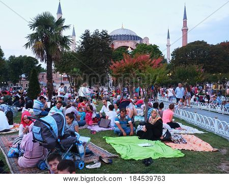 The Muslims Waiting For The Evening Meal (iftar) In Ramadan In Front Of Hagia Sophia, Istanbul